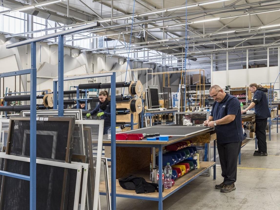 Our Chennai manufacturing unit — mosquito screen frames on the assembly benches